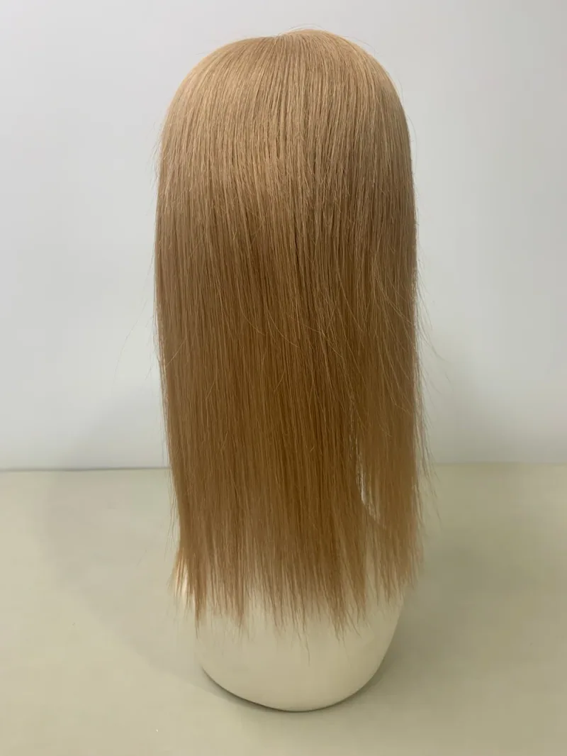 #8 hair topper — back view on a mannequin