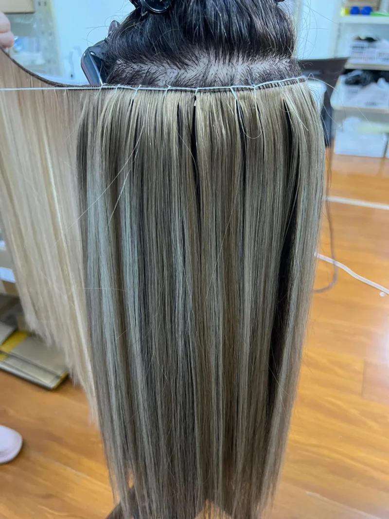 Super Genius Weft fitting close-up showing the stitching along the row