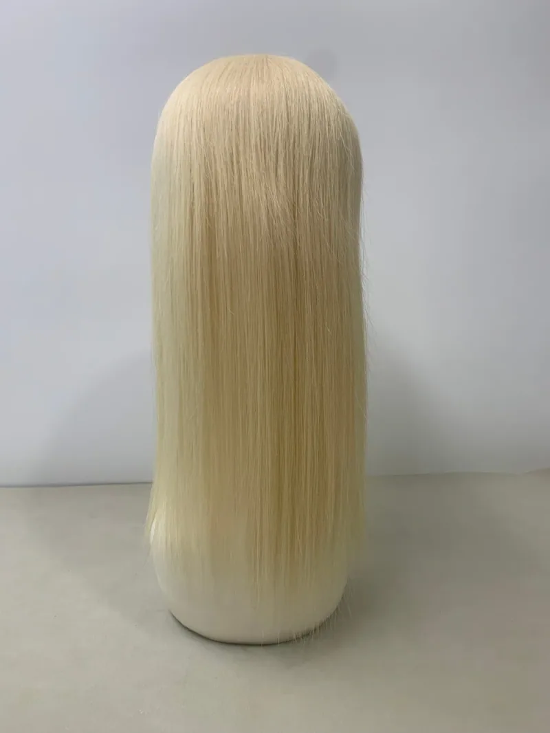 #613 hair topper — back view on a mannequin