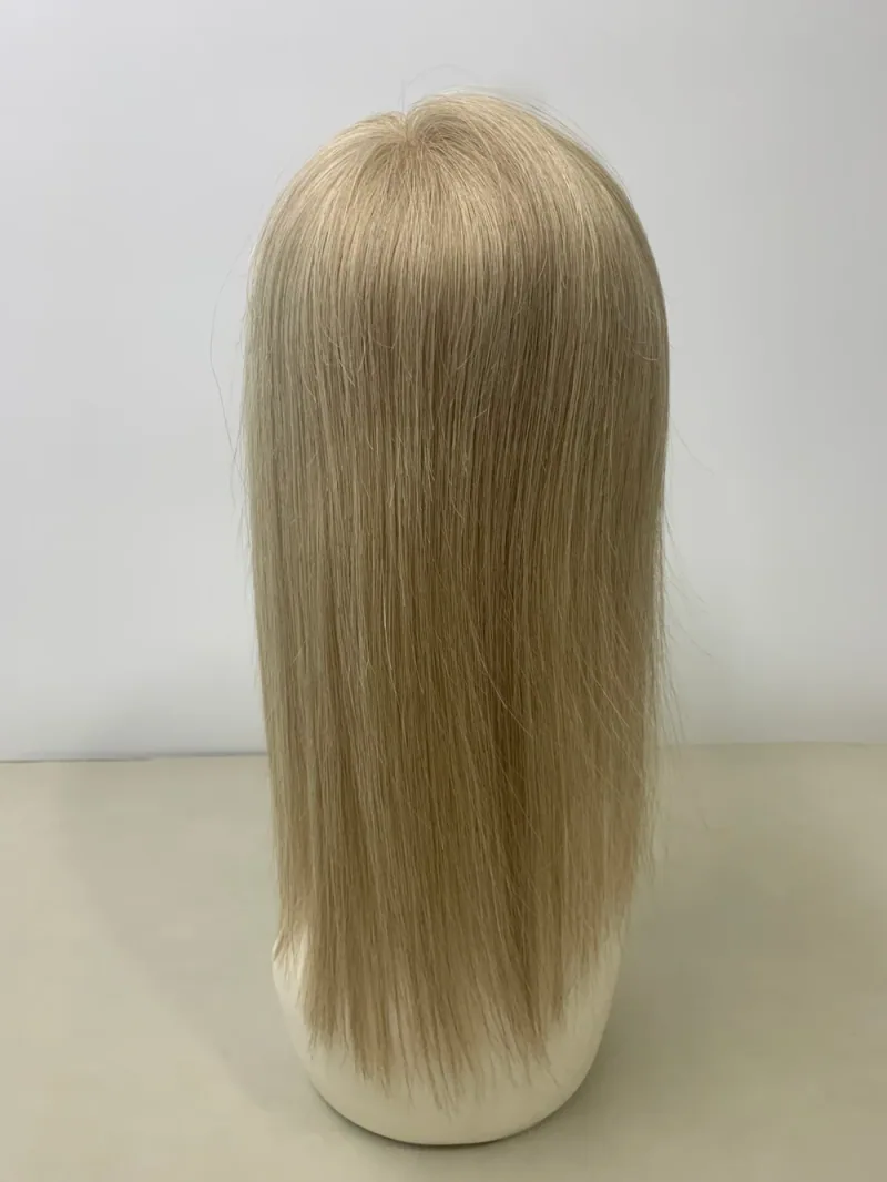 9/613 hair topper — back view on a mannequin