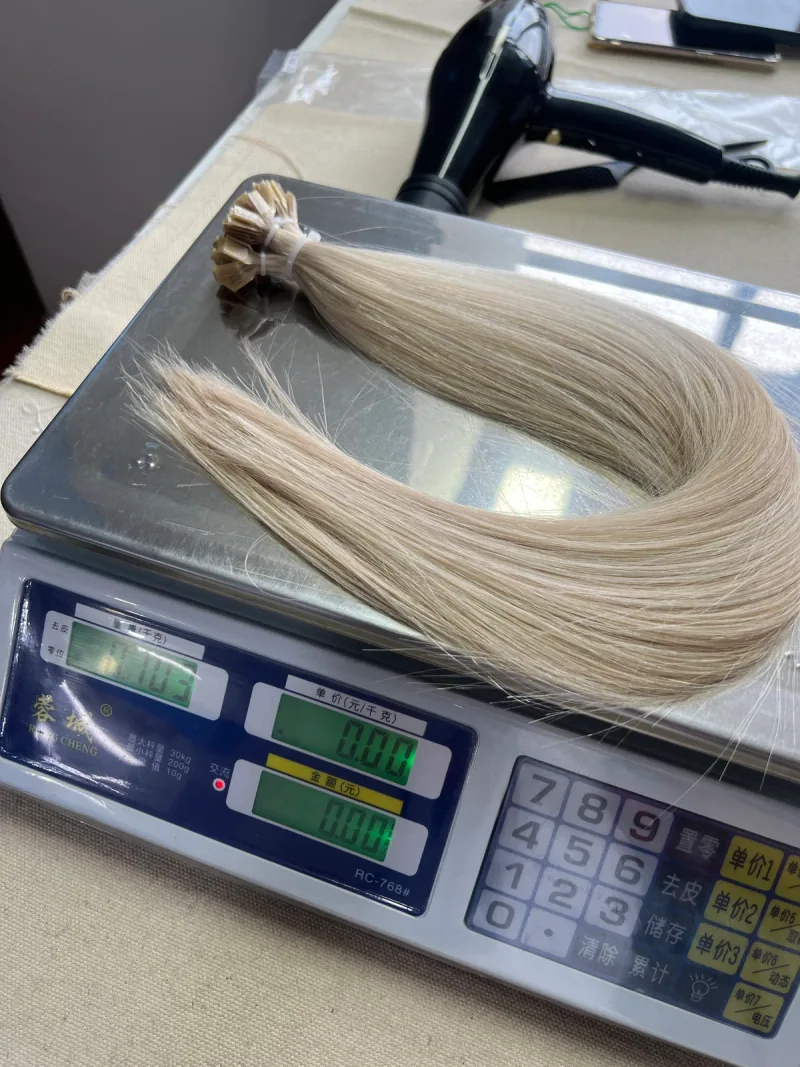 K-Tip / Flat Tip on a factory scale displaying 0.103kg, equivalent to 103g